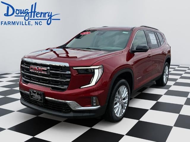2026 GMC Acadia Elevation in Volcanic Red Tintcoat — front three-quarter view