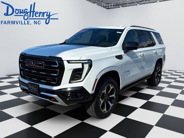 2026 GMC Yukon AT4 in Summit White — front three-quarter view