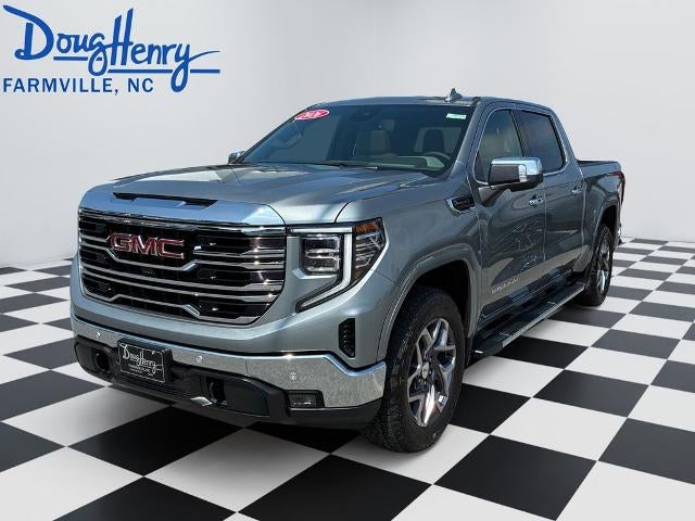 2026 GMC Sierra 1500 SLT in Sterling Metallic — front three-quarter view