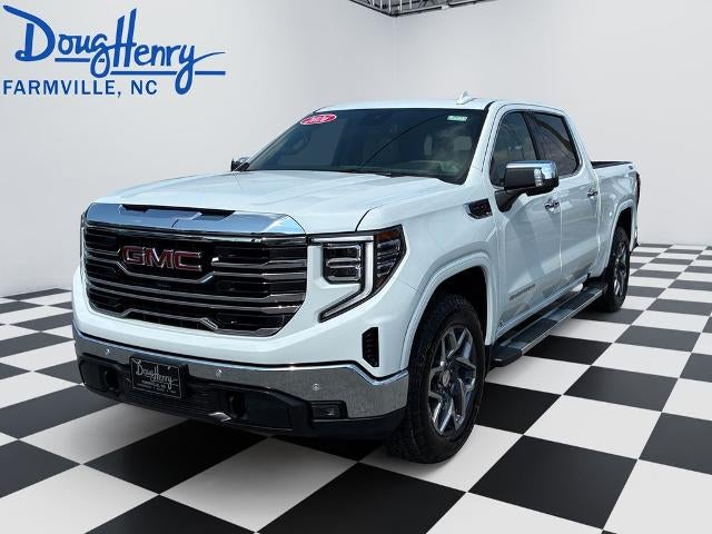 2026 GMC Sierra 1500 SLT in Summit White — front three-quarter view