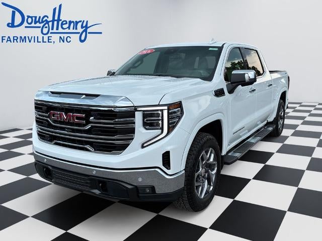 2026 GMC Sierra 1500 SLT in Summit White — front three-quarter view